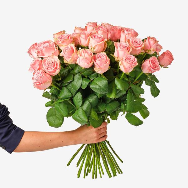 Roze Rozenboeket in hand