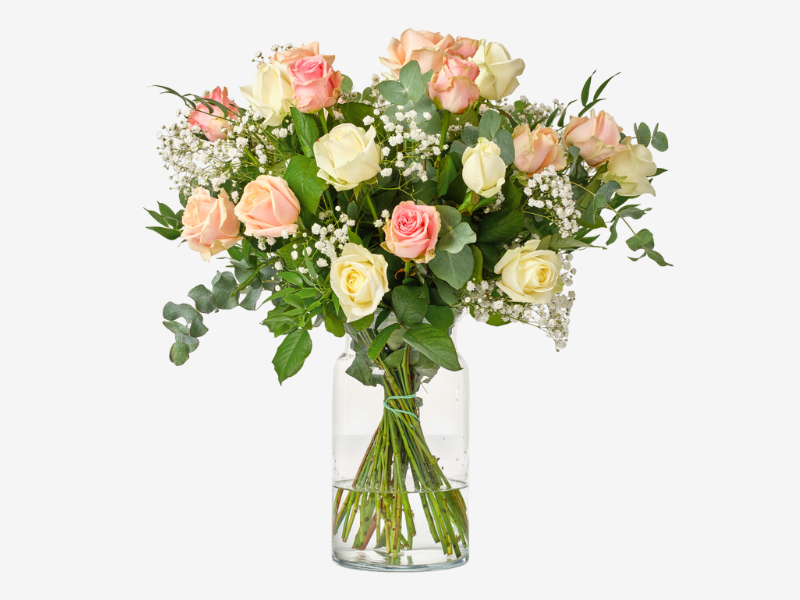 Roze rozenboeket vaas
